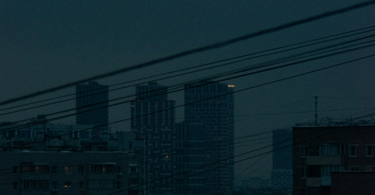 a view of a city at night from a distance