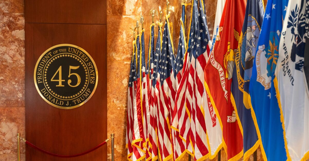 a room filled with flags and a plaque