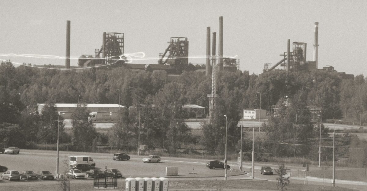 a black and white photo of an industrial area