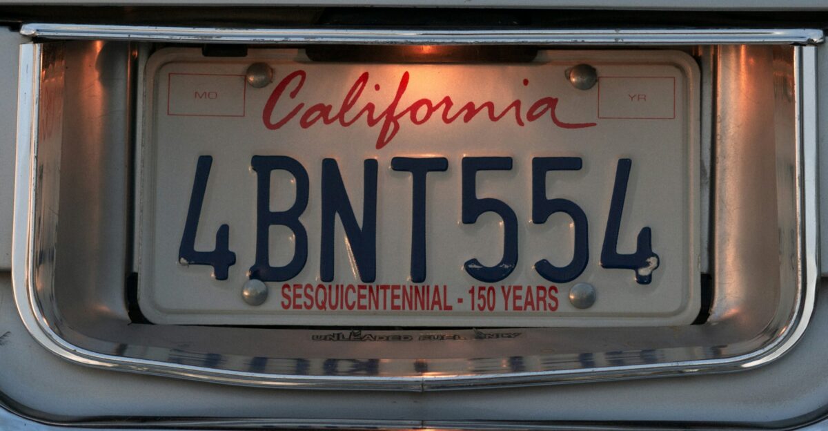 A california license plate with the word california on it