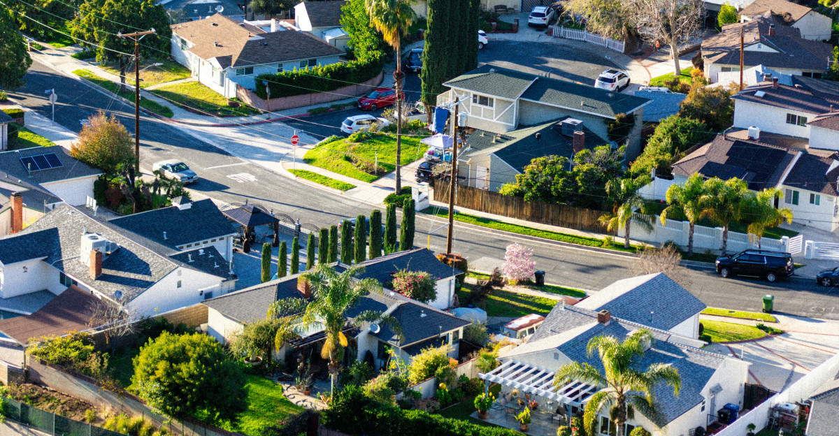 An aerial view of a city with lots of houses
