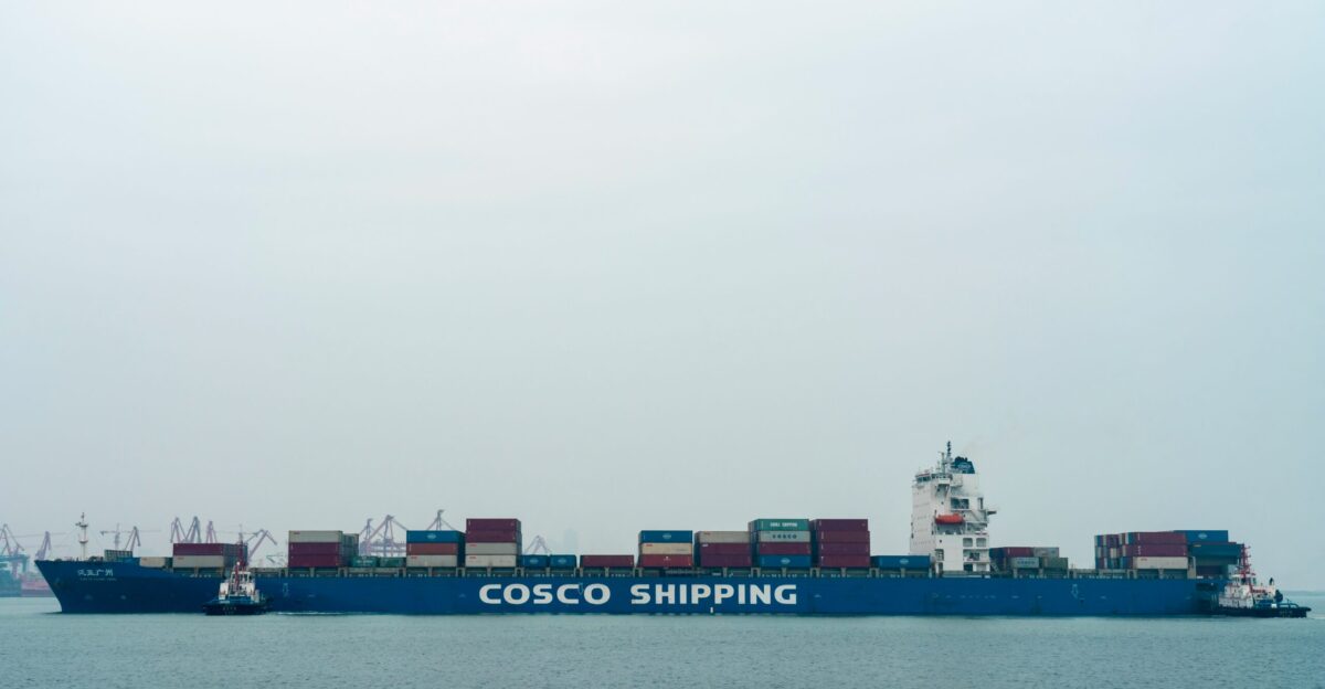 A large cargo ship in the middle of the ocean