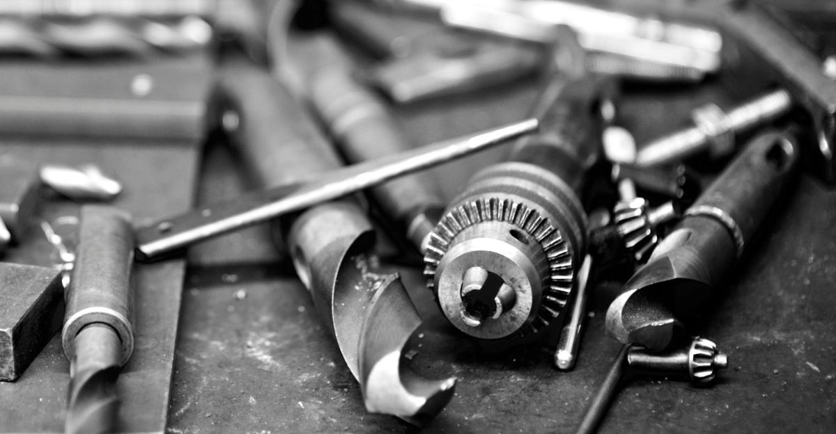 Workshop tools are scattered on a work table.
