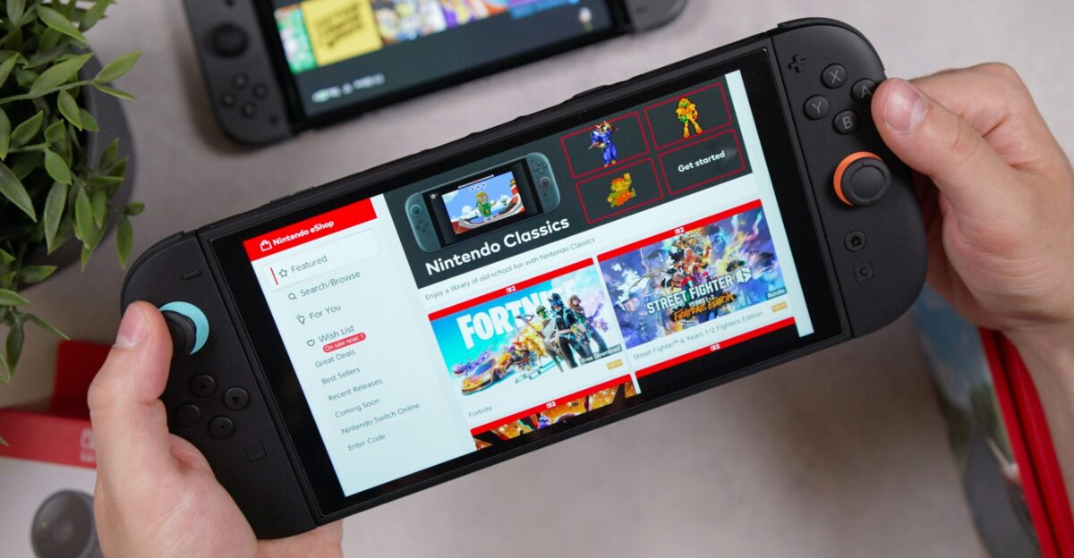 Someone is holding a handheld gaming console