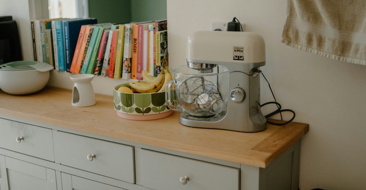 Kitchen counter with mixer fruit bowl and books