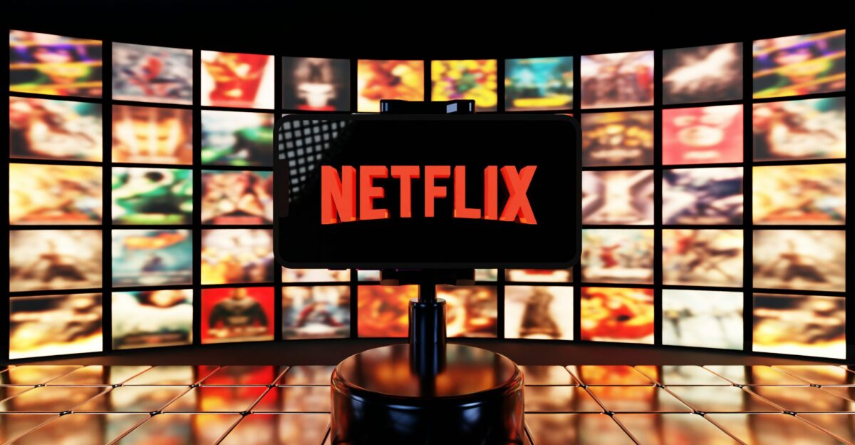 Netflix logo displayed on a screen with movie posters