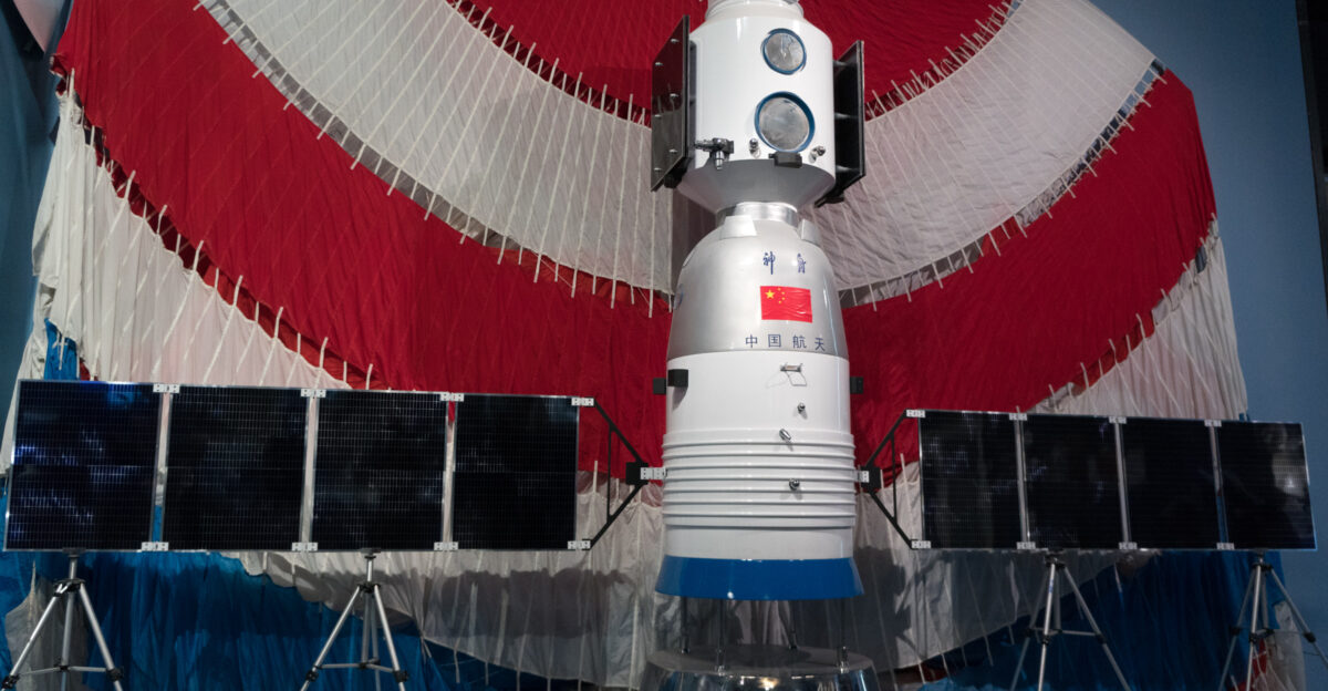 Shenzhou-5 spacecraft mockup and parachute displayed at the National Museum of China