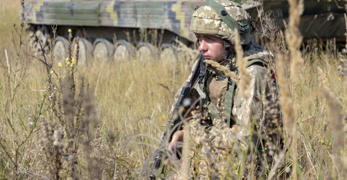 A soldier from the Armed Forces of Ukraine defends his post during a forward operating base security exercise as part of Rapid Trident 2019 Sept 24 2019 near Yavoriv Ukraine RT19 is an annual multinational exercise which involves approximately 3 700 personnel from14 nations that supports joint combined interoperability among the partner militaries of Ukraine and the United States as well as Partnership for Peace nations and NATO allies U S Army photo by Pfc Caleb Minor