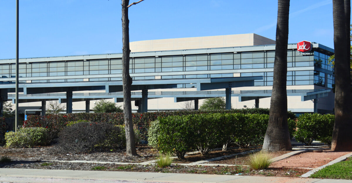 At the time this photograph was taken this office building at 9357 Spectrum Center Boulevard in San Diego California was home to Jack in the Box s Restaurant Support Center the company s de facto corporate headquarters Photographed by user Coolcaesar on February 15 2025