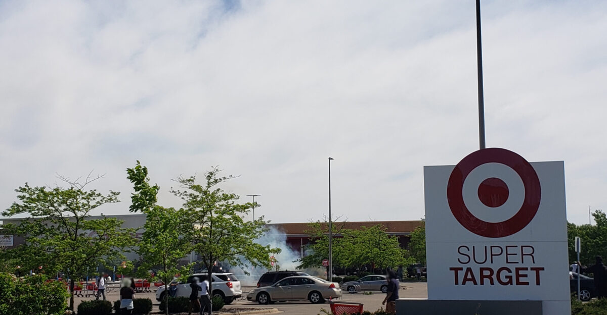 Protesters gathered outside the Super Target in the Hamline-Midway neighborhood of St Paul Minnesota on Thursday May 28th 2020 in response to the murder of George Floyd three nights prior Police arrived soon after the protesters driving off the few in the store and forming lines in front of the entrances Tear gas was fired into the crowd dispersing them from the front end of the parking lot outside the store