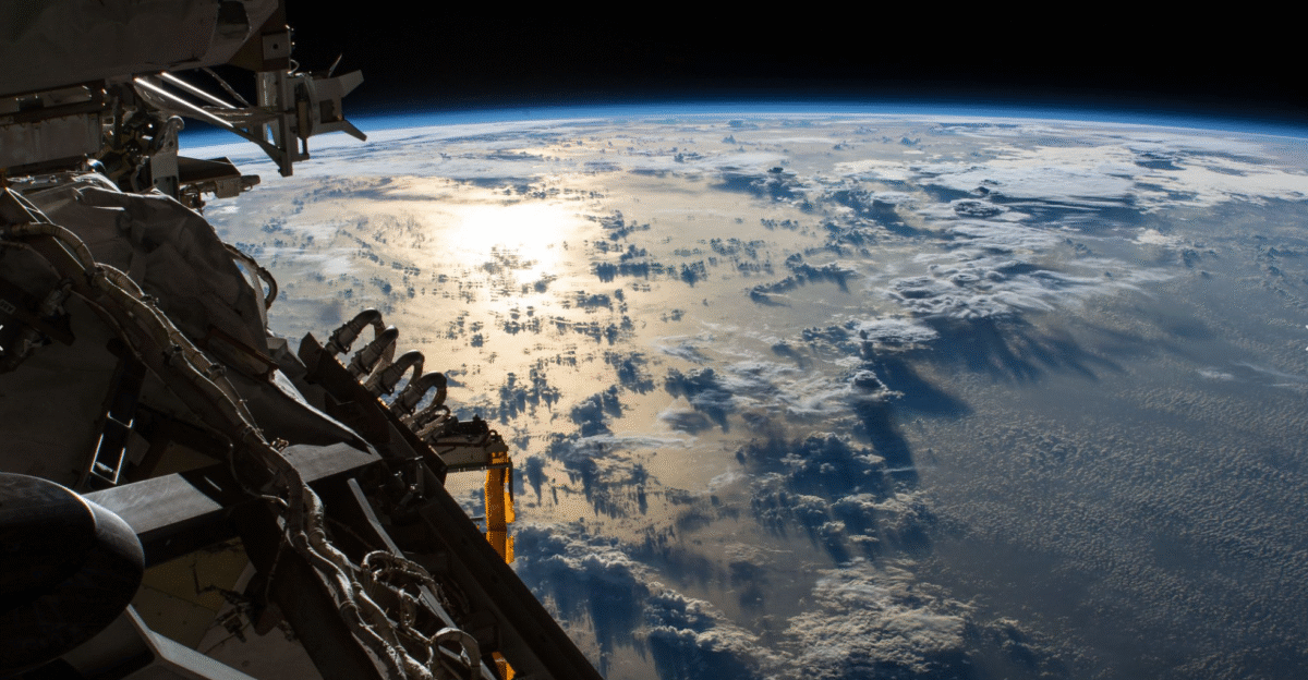 The Pacific Ocean The view of Earth taken from the Space Shuttle is dominated by the Pacific Ocean Above the water are clouds of water vapor and a volcanic ash plume a reminder of the continuing geological activity of the planet s interior