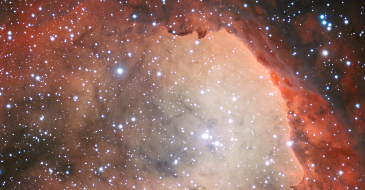 The Wide Field Imager on the MPG/ESO 2.2-metre telescope at the La Silla Observatory has imaged a region of star formation called NGC 3324. The intense radiation from several of NGC 3324's massive, blue-white stars has carved out a cavity in the surrounding gas and dust. The ultraviolet radiation from these young hot stars also cause the gas cloud to glow in rich colours.