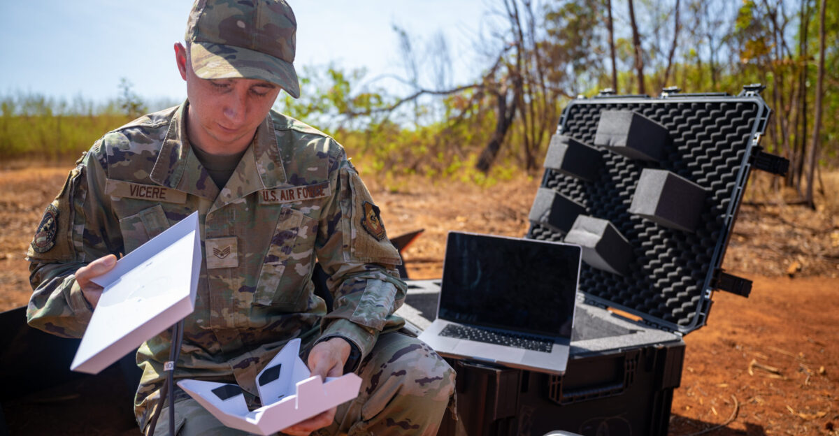 U S Air Force Staff Sgt Antonio Vicere a member of the 1st Combat Camera Squadron deploys a Starshield Terminal at Royal Australian Air Force Tindal Australia Aug 4 2024 Austere locations leverage the 1 CTCS Cyber Systems Technicians ability to enable the rapid transmission of imagery in any environment U S Air Force photo by Senior Airman Mitchell Corley