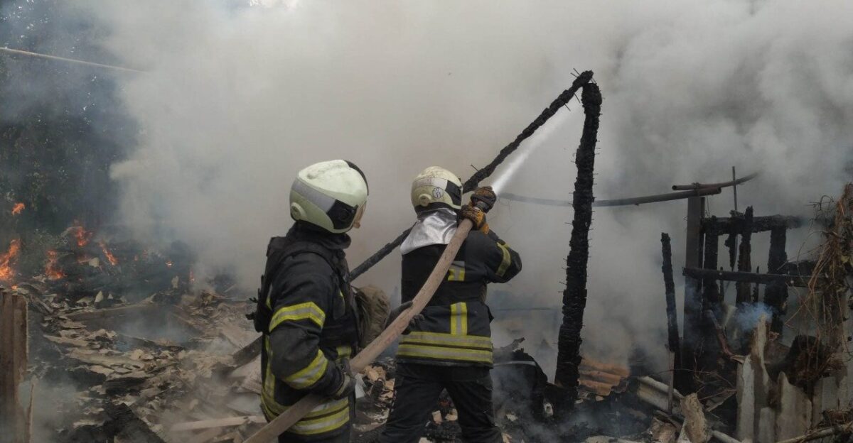 Ukrainian firefighters douse the flames of a fire caused by Russian shelling in Lysychansk on July 1 2022
