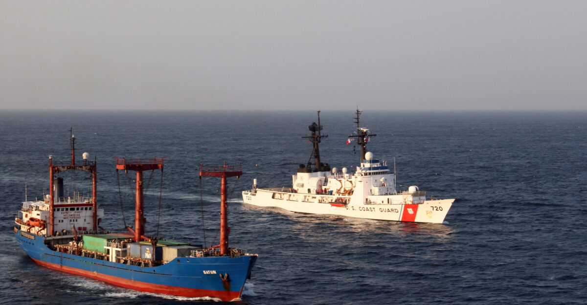 The Coast Guard Cutter Sherman homeported in Alameda Calif cruises alongside the Panamanian flagged motor vessel Gatun off the coast of Panama March 2007 Crews of the Sherman and San Diego-based Coast Guard Cutter Hamilton seized 42 845 pounds of cocaine from the vessel making it the largest maritime drug busts ever for the Coast Guard
