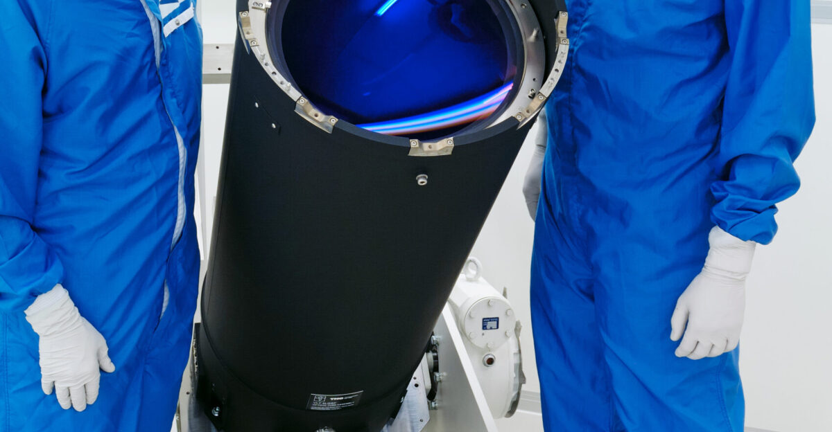 This telescope is an important new component of the Four Laser Guide Star Facility which will sharpen the already excellent vision of ESO s Very Large Telescope VLT Four powerful 20-watt lasers fired to an altitude of 90 kilometres up in the atmosphere will help the VLT correct the image distortion caused by turbulence in the air The Netherlands Organisation for Applied Scientific Research TNO is developing the launch telescopes through which the laser beams will be fired The first of these laser launch telescopes - known as the Optical Tube Assembly - is seen here in the cleanroom at TNO s Van Leeuwenhoek Laboratory in Delft the Netherlands having recently held its Acceptance Review A special anti-reflective coating gives the lens on the telescope a distinctive blue hue The photograph was taken by Fred Kamphues who appears on the left He is project manager for the Optical Tube Assembly and is also a new ESO Photo Ambassador On the right is system engineer Rens Henselmans