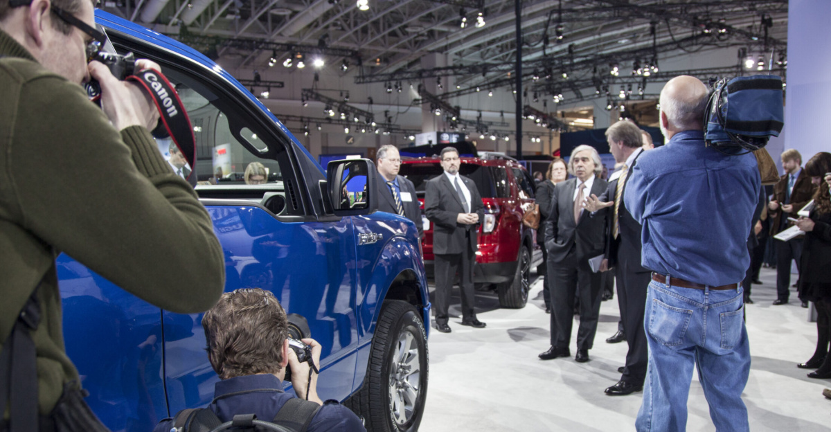 Secretary Moniz talks with a Ford representative about the company’s F-150, its best-selling vehicle. The new 2015 F-150 uses aluminum alloys throughout its body, helping to shave more than 500 pounds off the vehicle and leading to better fuel economy. Ford’s work on lightweight material builds on research the Energy Department supported in this area in the late 1990s and early 2000s. Photo by Sarah Gerrity, Energy Department.