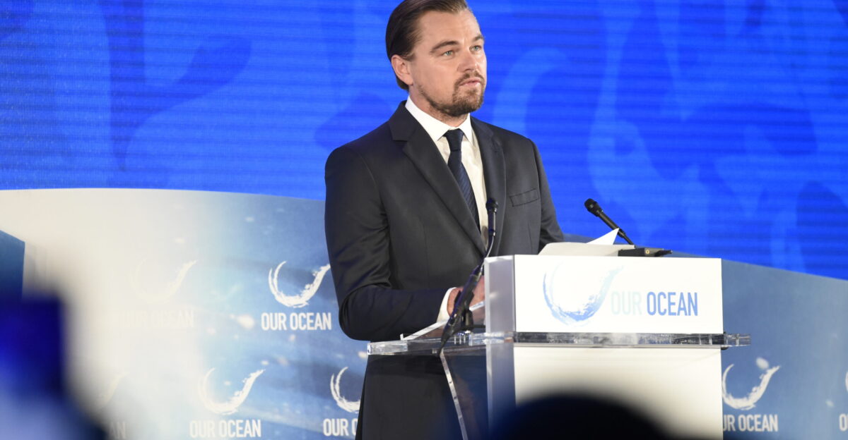 U S Secretary of State John Kerry watches actor and environmentalist Leonardo DiCaprio on September 15 2016 as he addressed the third Our Ocean Conference at the U S Department of State in Washington D C State Department Photo Public Domain