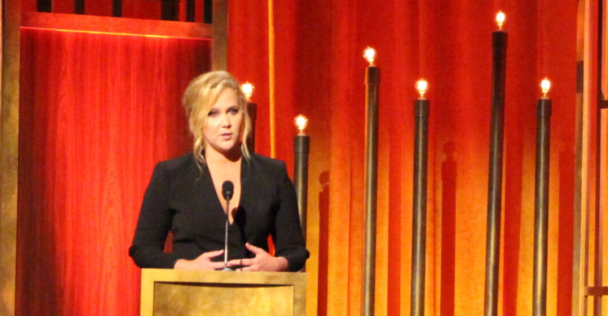 Executive Producer Amy Schumer accepts the Peabody for her show, Inside Amy Schumer. She is joined on stage by (from left to right) Jessi Klein, Kim Caramele, Dan Powell, Tina Fey, Kevin Kane and Steve Ast.