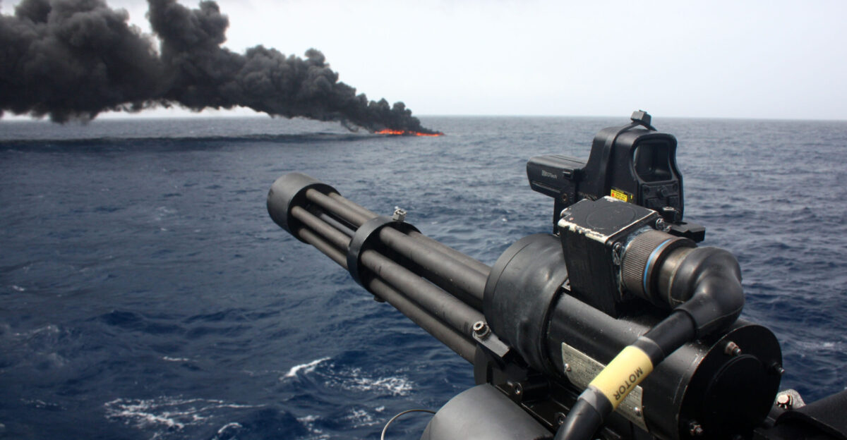A speedboat burns in the distance after being hit by rounds from the Minigun foreground of Type 23 frigate HMS Iron Duke following a drugs seizure and detainment of the crew The vessel was boarded and searched and a large haul of contraband was seized Royal Navy Frigate HMS Iron Duke seized approximately three-quarters of a tonne of cocaine possibly destined for the streets of Europe and the UK The drugs with an estimated UK wholesale value of over 33 million were seized in a night time operation off the coast of South America At street level the cocaine is heavily adulterated substantially raising the criminal profits therefore this seizure represents a serious financial loss to the drug barons and dealers throughout the chain On patrol in the Caribbean the Portsmouth-based warship HMS Iron Duke s primary task is to reassure and assist the UK Overseas Territories during the hurricane season As well as this core role the Type 23 frigate conducts counter drugs operations as part of a multi-national task force