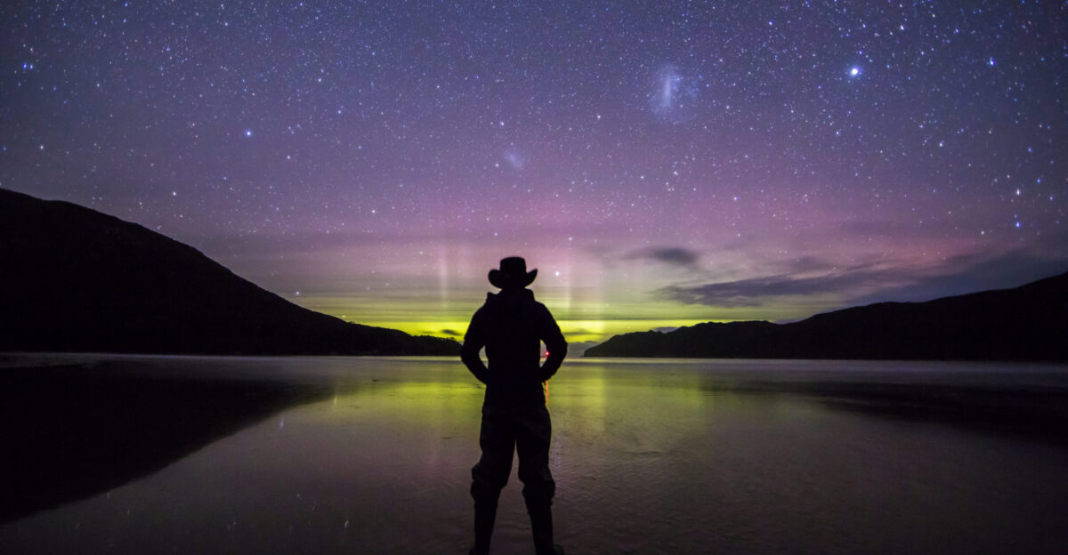 Aurora Australis glows along the horizon from New Harbour Beach in Tasmania Southwest National park