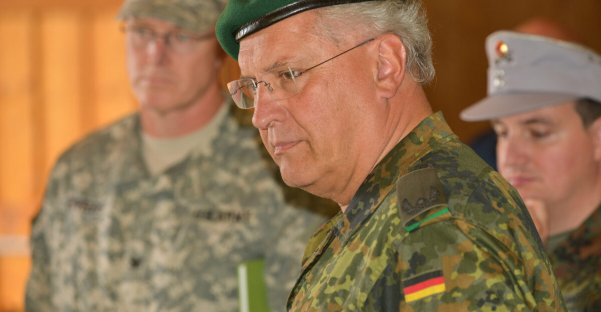 The Bavarian Minister of the Interior Maj Res Joachim Herrmann receives an information briefing on the capabilities of the U S Army s Joint Multinational Training Command s training facilities on the Grafenwoehr Training Area Germany Sept 2 2014 The minister saw how the Army conducts combat trauma training at the Medical Simulation Training Center and how virtual scenarios at the tactical gaming division of the Joint Multinational Simulation Center are helping U S NATO and partner-nation forces in Europe better hone their training program through efficient and repetitious practice Grafenwoehr is the largest U S Army installation in the state of Bavaria U S Army photo by Markus Rauchenberger released