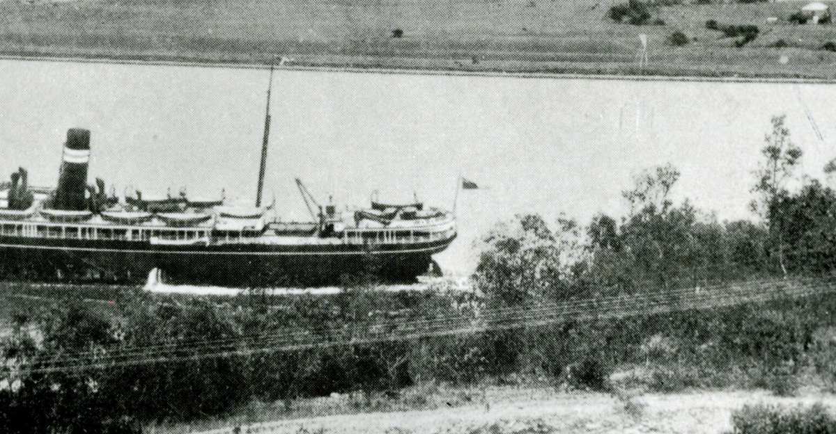 <p>QSA Item ID 435739
<strong>View this and other original records at the Queensland State Archives:</strong>
<a href="<a rel="nofollow" class="external free" href="http://www.archivessearch.qld.gov.au/Search/SeriesDetails.aspx?SeriesId=189">http://www.archivessearch.qld.gov.au/Search/SeriesDetails.aspx?SeriesId=189</a>" rel="noreferrer nofollow">Series ID 189</a>
</p><p>Brisbane's recorded history dates from 1799, when Matthew Flinders explored Moreton Bay on an expedition from Port Jackson, although the region had long been occupied by the Yugara and Turrbal aboriginal groups. First Nations Australians lived in coastal South East Queensland (SEQ) for at least 22,000 years, with an estimated population between 6,000 and 10,000 individuals before European settlers arrived in the 1820s. 
</p><p>At this time the Brisbane area was inhabited by the Turrbal people, (Turrbal also being the name of the language they spoke) who knew the area that is now the central business district as Mian-jin, meaning "place shaped as a spike". Archaeological evidence suggests frequent habitation around the Brisbane River, and notably at the site now known as Musgrave Park. 
</p><p>The first convict jail was built in Redcliffe in 1824 and that was moved to the site of the present-day CBD in 1825. Officials believed the natural bend in the river provided an effective barrier against escape.
</p><p>Its suitability for fishing, farming, timbering, and other occupations, however, caused it to be opened to free settlement in 1838. Civilian occupation of the area began in 1842, and by the late 1880s Brisbane became the main site for commerce, and the capital-to-be began to develop distinct architectural features and culture.
</p><p>With an abundance of sunshine and laid-back lifestyle, Brisbane quickly drew people eager to settle in its environs. The city grew steadily over the years and a turning point in its advancement was during World War II when it housed the main allied headquarters in the South Pacific for Australian and American service personnel.
</p><p>The post-war population boom brought a spurt in industry and Brisbane staked a claim as the third-largest city in Australia.
</p><p>Despite its rapid progress, Brisbane was often seen as lagging culturally behind Sydney and Melbourne. But two landmark events in the 1980s brought about a major change and accelerated Brisbane towards Australia’s new world city it is today.
</p><p>The Commonwealth Games came to Brisbane in 1982, and this resulted in a massive injection of new infrastructure and sporting facilities. Then the eyes of the world turned to Brisbane in 1988 and thousands of visitors flocked to Expo 88. The subsequent birth of South Bank on the Expo site has resulted in a thriving cultural hub and Brisbane is more than matching it with its southern counterparts.
</p><p>FIRST NATIONS HISTORY
Prior to European colonisation, the Brisbane region was occupied by Aboriginal tribes, notably clans of the Yugara, Turrbal and Quandamooka peoples. The oldest archaeological site in the Brisbane region comes from Wallen Wallen Creek on North Stradbroke Island (21,430±400 years before present), however, settlement would likely occurred well prior to this date. 
</p><p>The land, the river and its tributaries were the source and support of life in all its dimensions. The river's abundant supply of food included fish, shellfish, crab, and prawns. Good fishing places became campsites and the focus of group activities. The district was defined by open woodlands with rainforest in some pockets or bends of the Brisbane River. 
A resource-rich area and a natural avenue for seasonal movement, Brisbane was a way station for groups travelling to ceremonies and spectacles. The region had several large (200–600 person) seasonal camps, the biggest and most important located along waterways north and south of the current city heart: Barambin or 'York's Hollow' camp (today's Victoria Park) and Woolloon-cappem (Woolloongabba/South Brisbane), also known as Kurilpa. These camping grounds continued to function well into historic times, and were the basis of European settlement in parts of Brisbane. 
</p><p>TOWN PLAN
Buildings were constructed for the convict settlement, generally at right angles to the river's shoreline in the direction of Queen Street, and along the shoreline south-east of today's Victoria Bridge. The outstanding surviving building is the Commissariat Store (1828-29), originally two storeys, in William Street. The street layout, however, developed from a thoroughfare from the river's edge running north-east to the prisoners' barrack near the corner of today's Queen and Albert Streets. When a town survey was done in 1840 that thoroughfare was chosen as the main street – Queen Street – and the grid pattern of square blocks moved out from the Queen Street axis. There were several versions of the town survey. The proposed streets varied in width from 20 to 28 metres but Governor Gipps, anticipating an inauspicious future for the settlement, trimmed them back to the lesser figure. Streets running parallel to Queen Street were named after British and related royalty, among them Queen Mary II, Queen Charlotte (wife of George III) and Queen Adelaide (wife of William IV). William, George, Albert and Edward Streets, running at right angles, had similar royal antecedents. Creek Street's position approximated the course of a minor stream, Wheat Creek.
</p><p>The town survey occurred about three years after a select committee of the British Parliament had concluded that transportation had ceased to deter crime and, in any event, was tainted with inhumanity. By 1839 Moreton Bay was being transformed from a convict settlement to a free settlement, and in July 1842 the first sales of Brisbane land took place in Sydney. Nearly 60 allotments, each of 36 perches, in North and South Brisbane were offered. Twelve months later blocks in Kangaroo Point were sold. Little care was taken to reserve land or space along the river's edge for public purposes, but the government farm at the south-east end was kept and in time became the botanic gardens.
</p><p>OUTER SETTLEMENTS
The scatter of urban land sales detracted from North Brisbane's role as a central place in Moreton Bay. Wharves were set up on both sides of the river, and there was an Ipswich-Cleveland 'axis' backed by rural interests which wanted the administrative centre and a port at those places. Probably it was the building of a customs house in 1849 on the river in North Brisbane which had a decisive effect: wharf interests moved, to be closer to the customs house, which in turn influenced the location of warehouses and merchandising. South Brisbane remained at a disadvantage until a permanent Victoria Bridge (1874) replaced ferry crossings.
</p><p>Four years after the first land sales North and South Brisbane's populations were 614 and 346 respectively. The town was nothing much to look at: convict buildings were dilapidated, new structures had been roughly built and mainly it was the steady inflow of new inhabitants which held the best prospects for improvement. A Catholic school had been opened in 1845 and the Moreton Bay Courier weekly newspaper began publication in 1846, but it was not until the end of the decade that noticeable civic amenities emerged. Coinciding with the arrival of the Fortitude immigrants in 1849 (who were settled outside the town boundary, north of Boundary Street), an Anglican school was opened and a Wesleyan church built in Albert Street. A school of arts was established, moving into its own hall in Creek Street in 1851. Regular postal deliveries were introduced in Brisbane in 1852.
During the 1850s most Churches constructed substantial buildings: St Stephens Catholic in Elizabeth Street (1850), St Johns Anglican, William Street, Presbyterian, Ann Street (1857) and Baptist, Wharf Street (1859). There were three ferry services, to South Brisbane, Kangaroo Point and the 'middle' service from Edward Street, also to Kangaroo Point. The Brisbane Municipal Council was proclaimed, just before colonial self-government, in 1859.
</p><p>There had been land sales well beyond the town boundaries, but in the early 1860s allotments were cut up for working-class cottages in Spring Hill, Petrie Terrace and Fortitude Valley. In 1861 a census recorded over 8000 people in Brisbane and another 5000 in adjoining areas. An Ipswich to Brisbane telegraph began operation and the unused convict windmill (1828) up in Wickham Terrace was converted to a signal station with a time ball.
</p><p>TOWN IMPROVEMENTS
Municipal improvements were brought in with improved town lighting from the Brisbane gas works (1864) in Petrie Bight, north of the customs house, and the widely felt need for recreation space was officially recognised by a survey of Yorks Hollow (where the Fortitude migrants had been sent) for Victoria Park. Progress there was slow, with the council using the site for sewage disposal until 1886. Fires rid parts of Queen Street of time-worn commercial buildings in 1864, clearing the way for better structures built under the supervision of fire-protection bylaws. The council also found the need to divide its area into four wards, expanding it into six in 1865 (East, West, North, South, Valley and Kangaroo Point). The council also expanded to a new town hall in Queen Street (1866), by when a short-lived bridge to South Brisbane (1865-67) was in operation. The water supply ponds were hopelessly inadequate, and in 1866 a supply from Breakfast Creek, Enoggera, was turned on.
</p><p>Gympie gold (1867) brought prosperity to the colony, but the rural-dominated legislature spent the money outside Brisbane, a prime example being the Darling Downs railway to Ipswich (1867) with the intent of having a port on the Bremer River. Legislative shenanigans could not stop the growth of the capital city's population (15,000 in 1871, 23,000 in 1881) nor that of the adjoining suburbs. Brisbane's 1881 population of 23,000 included South Brisbane. Ten years later, after South Brisbane had been made a separate municipality in 1887, their combined populations were 49,000. By 1891 Brisbane and suburbs had a population of over 100,000.
</p><p>With population and export income from gold there came pressure for public buildings appropriate to the town's growing prosperity. The first of them was the general post office in Queen Street (1872), followed by the government printing office (1874) near the Commissariat Store in William Street. A torrent came in the 1880s, with the Queensland National Bank at the corner of Queen and Creek Streets, the Margaret Street Synagogue, Finney Isles Big Block emporium in Adelaide Street, and in 1889 the new Customs House, the Treasury Building in William Street and the Ann Street Presbyterian church. The legislature aspired to grandeur quite early, in 1868, with its Parliament House near the botanic gardens.
</p><p>TRAINS AND TRAMS
The Ipswich railway line was joined to Brisbane by a bridge across the river at Chelmer and Indooroopilly in 1876. Ten years later a line to the South Coast was under construction, but the lines were at first organised with rural freight rather than suburban passengers in mind. Suburban transport services started with a horse tram out to New Farm (1885-86), and across the Victoria Bridge to West End. Electric powered trams began in 1887. Central Brisbane was crossed by a Queen Street tram, connected to termini at Newstead, West End and Logan Road at Buranda. The main shopping centre was around Queen, George and Adelaide Streets, competing with Brunswick and Wickham Streets in Fortitude Valley. The south side had shopping at Five Ways, Woolloongabba, and at South Brisbane, although the latter declined after the 1893 floods.
</p><p>Northside tram lines from Red Hill, Kelvin Grove, Clayfield and Hamilton were opened during 1897-1902, coming into the city via Edward Street in most cases. By 1890 there were also suburban railway lines, to Sandgate via Nundah (1882), to Enoggera and to Cleveland (1889). Brisbane Central station (1889) brought northside travellers right into Brisbane, as before then the Sandgate line had ended at Roma Street via a cost saving line through Victoria Park. The line to Brisbane Central station also passed through busy Fortitude Valley.
With the addition of a tram line to Lutwyche and Kedron in 1913 the pressure of traffic led to the construction of a line along Adelaide Street (1915), which in turn required the Council to widen Adelaide Street by four metres between George and Creek Streets in 1922-23.
</p><p>HOUSE SIZES
Since 1885 minimum house allotments had been set at 16 perches (10m x 40m). Residents could therefore look forward to more airy, spacious houses outside the city and its adjoining suburbs such as Spring Hill and Petrie Terrace. The better-off population invariably sought out the higher ridges on elevated sites overlooking the river, making Hamilton (with a tram in 1899) one of the most sought after suburbs. It was the new upper-working and middle-class suburbs, however, that showed the change most clearly.
</p><p>CENTRAL CITY SHOPPING
Central Brisbane had grand department stores, Finney Isles, and Allan and Stark, but not as many as Fortitude Valley. A third one came later in George Street, near the Roma Street railway station: McDonnell and East built a low-rise emporium there in 1912. Commercial and government buildings, usually of a modest height, sometimes had a massive footprint. An exception to the prevailing height practice was the Queensland (later Commonwealth) Bank administration building of eight storeys at the corner of George and Elizabeth Streets (1920) clad with sandstone and granite. The CML building, next to the GPO, went to the legal limit of 11 storeys in 1931 and was exceeded in height only by the Brisbane City Hall tower (1930).
</p><p>The changing commercial centre was thought to need a distinctive civic space and an Anzac Square was proposed in 1915. It was completed in 1930, coinciding with the City Hall and the construction of a second bridge out of the city, across the river to South Brisbane. Named after William Jolly, first Lord Mayor of the amalgamated Brisbane Metropolitan Council (1925), the bridge was opened in 1932. A third bridge was opened in 1940 from the other (eastern) end of the city across to Kangaroo Point. Neither bridge had trams, but each integrated with the metropolitan council's planned arterial road system.
</p><p>The opening of the Story Bridge was followed by 20 years of building quietude in central Brisbane. The war and postwar recovery explains part of the inactivity, but central Brisbane made do with its prewar building stock during the 1950s. Suburban expansion was the focus of activity, exemplified by Allan and Stark building a drive-in shopping centre at Chermside in 1957. Another change was the removal of the wholesale food market from Roma Street to Rocklea in 1962.
After recovery from the 1961 credit squeeze, commercial pressure and interstate example succeeded in raising the building height limit. The Pearl Assurance building (1966) at Queen Street was 15 storeys and the Manufacturers Mutual Insurance building (1967), also in Queen Street, was 22 storeys. The SGIO building (1970) in Turbot Street was an even more significant structure.
</p><p>A lack of building activity in central Brisbane in the 1950s did not detract from its role as a retailing destination. Central city shopping boomed while there were low postwar car ownership and strong radial public transport services. The 1953 retail census for metropolitan Brisbane showed that the city and inner suburbs (Fortitude Valley, Bowen Hills, South Brisbane etc) had 74% of total retail sales.
</p><p>OFFICES AND SHOPS
Set against the decline in retailing was the growth in high-rise office and commercial buildings. By the late 1980s central Brisbane had about 1.75 million sq metres of office space, ten times the amount of retail floor space. Its share of metropolitan office space was over 70%, and fringe areas such as Spring Hill, Fortitude Valley, Milton and Woolloongabba had another 25%. The change in Brisbane's skyline was evident from across the river, an example being the view from Kangaroo Point to the Riverside Centre office building (1987) at Eagle Street. The eastern commercial end of Ann, Adelaide and Queen Streets began to resemble the closed in narrow streets of Sydney's office precinct.
In contrast to office high rise, the Queen Street retailing centre has kept many of its old buildings. The facades are partly concealed by pedestrian mall shade sails and other structures, but the shops and arcades generate plenty of activity. The most significant addition was the Myer Centre (1988) with eight cinemas and 200 other stores, bounded by Queen, Albert and Elizabeth Streets. It replaced Allan and Stark (Queen Street, opposite side) and McWhirters, Fortitude Valley, which had both been taken over by Myer several years before. When opened, the Myer Centre's retail floor area was nearly 108,000 sq m, 26% more than the largest competing regional drive-in centre, at Upper Mount Gravatt.
</p><p>PARKS AND RESIDENTS
By the 1960s the growth of metropolitan population and motor traffic was putting central Brisbane's streets under strain. All three river bridges fed into the central business district, although the Centenary Bridge (1960) at Jindalee gave temporary relief. Closer in, relief came in 1969 with the widening of the Story Bridge approaches, and the opening of the fourth Victoria Bridge, often known as the Melbourne Street Bridge. The Riverside Expressway was completed in 1976, a close-in ring road along the western edge of central Brisbane, from Victoria Bridge to the new Captain Cook Bridge, and leading to the south-eastern suburbs. The Expressway decisively altered the appearance of Central Brisbane. The tram crossing had ceased to function when trams were replaced by buses, but a railway crossing came very belatedly with the Merivale Bridge, linking South Brisbane and Roma Street stations in 1978. Prior to that the lines from Beenleigh and Cleveland and the trunk standard gauge from Sydney terminated at the South Brisbane station.
Roma Street had been the site of the wholesale food market, and for decades the land had remained under-used. The central city had incrementally added open spaces to its fabric – King George Square enlarged in 1975 and the Post Office Square opened in 1984 – and in 2001-03 the largest addition, the 16 ha Roma Street Parkland was completed.
</p><p>Along with Albert Park and Wickham Park, the Parkland gives inner city residents generous open space. The residential population of central Brisbane, however, changed little between 1981 and 2001. The inner city (approximately between Ann and Elizabeth Streets) had just 45 dwellings in 1981 and 689 in 2001. The resident populations for the respective years were 1174 and 976, a decrease. Apartments had replaced boarding houses and rooms. The rest of central Brisbane (including Petrie Terrace) also saw an increase in dwellings (758 to 1282) and a decrease in population (3511 to 1797). Single person apartments had increased, multi-person dwellings had decreased and some of each were not lived in full time, often being held for prospective capital gain. The boom in apartment building from 2001 has added thousands of apartments, many rented by overseas students.
</p><p>The distinctive features of twenty-first century Brisbane are its increasing resemblance to other capital city office precincts, with forecourts, sub-tropical decorative plants and outdoor cafes. Queen Street's signature silver bullet trams last ran in 1969, but the street's unusual width (Andrew Petrie apparently persuaded Governor Gipps on this point) has provided for a signature shopping mall with generous outdoor seating and dining areas. Out of the central retail area elegant sandstone government and commercial buildings have survived, surely an iconic architectural form. Some buildings have removed their clerks and accountants, substituting hotel patrons, tourists and casino visitors. The historic customs house was purchased by The University of Queensland from the federal government, and includes meeting, dining and gallery space. The City Hall (1930), once the tallest building, has been dwarfed by surrounding skyscrapers, so its clock tower no longer affords a commanding view over Central Brisbane. In 2008 the Brisbane City Council agreed to underpin City Hall which was in danger of gradual sinking on inadequate foundations.
</p><p>The gothic-style St Johns Anglican Cathedral, commenced in 1901-06, was finally completed in 2009. Bounded by Ann and Adelaide streets, the cathedral roof and other buildings sustained extensive damage in a storm in 2014.
</p>
Source: <a href="<a class="external free" href="https://en.wikipedia.org/wiki/Brisbane">https://en.wikipedia.org/wiki/Brisbane</a>" rel="noreferrer nofollow">en.wikipedia.org/wiki/Brisbane</a> & <a href="<a rel="nofollow" class="external free" href="https://www.visitbrisbane.com.au/information/about-brisbane/history-of-brisbane">https://www.visitbrisbane.com.au/information/about-brisbane/history-of-brisbane</a>" rel="noreferrer nofollow">www.visitbrisbane.com.au/information/about-brisbane/histo...</a> & <a href="<a rel="nofollow" class="external free" href="https://queenslandplaces.com.au/brisbane-central">https://queenslandplaces.com.au/brisbane-central</a>" rel="noreferrer nofollow">queenslandplaces.com.au/brisbane-central</a>