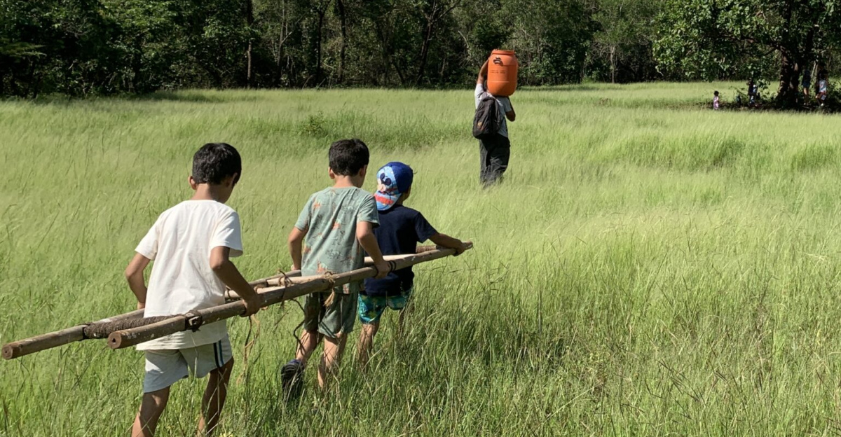 Children exploring the Verla Canca grasslands and forest, Bardez, Goa