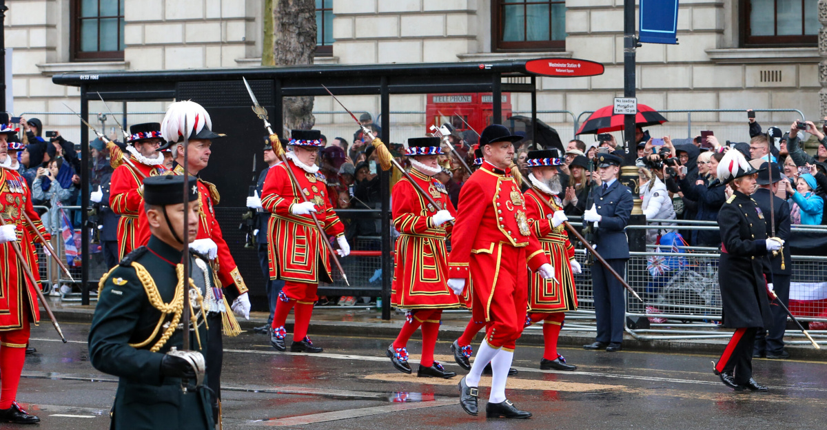 Coronation Procession at the Coronation of Charles III and Camilla - The King's Bargemaster, Yeomen Warders of HM Fortress the Tower of London / The King's Bodyguard the Yeomen of the Guard, King's Gurkha Orderly Officer