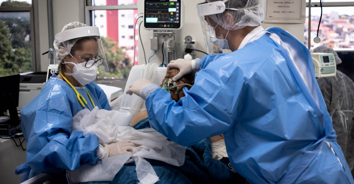 A team of doctors nurses and physiotherapists care for critically ill COVID-19 patients in the ICU of the Vila Nova Cachoeirinha hospital in the north of S o Paulo