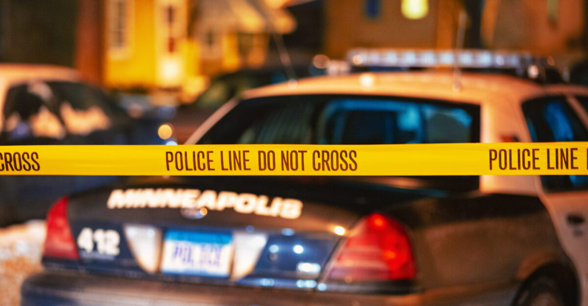 A Minneapolis Police Department squad car with a police line in front of it on February 6 2013