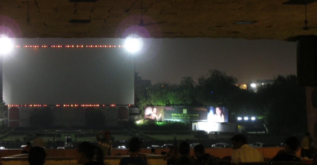 Sunset Drive-in an open Air Cinema with the largest screen in Asia is located at Ahmedabad It is first of it s kind which can room about 665 cars at a time More than 6000 people can enjoy watching movie at a time Started on September 6th 1973 the first film it hosted was ABHIMAAN Till date this theatre is one of the most popular hang-outs in the city Dolby Sound and Covered sitting facility attracts people who don t own cars as well Being one of the best family entertainment spot it caters to all the age groups The restaurant at Drive-in offers wide variety of food at best prices On Friday one can find an enthusiastic crowd of young fashion conscious crowd of guys and gals and freaking out As seen from the rear seats