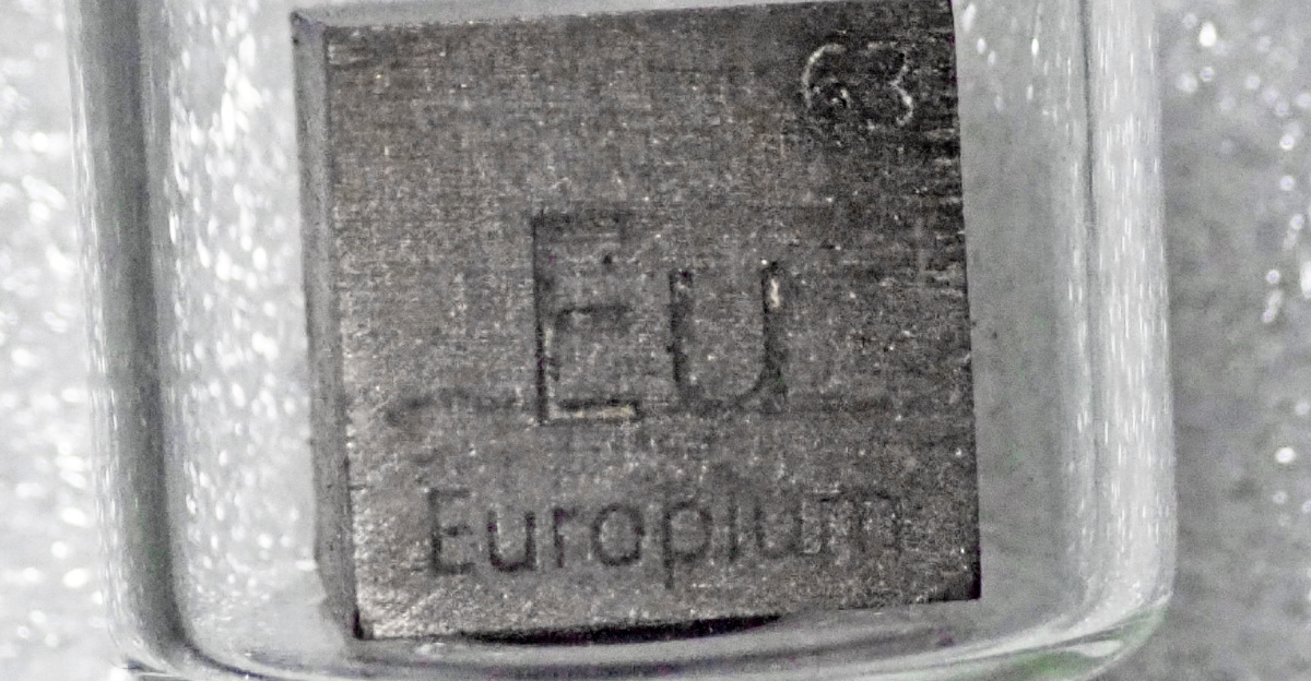 Europium (Eu) is # 63 on the Periodic Table of Elements.  Elemental europium is a silvery-gray metal.  It is one of the "rare earth elements" (REEs).  Few minerals have europium.
<p>Forty-one isotopes of europium are known - two occur naturally.  Europium-153 and europium-151 occur in nearly-equal amounts.
</p>
<hr>
<p>Info. at:
en.wikipedia.org/wiki/Europium
and
</p>
en.wikipedia.org/wiki/Isotopes_of_europium