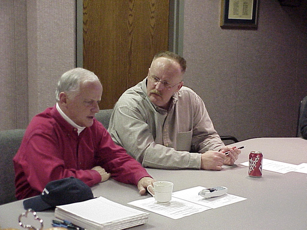 Oklahoma City OK February 7 2002 - FEMA Director Joe M Allbaugh talks with Oklahoma Governor Frank Keating left during a briefing before state and federal officials began a tour on February 7 of areas damaged by the recent winter ice Photo by Gene Romano FEMA News Photo