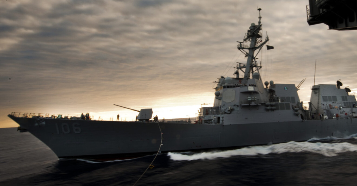 PACIFIC OCEAN (Jan. 4, 2011) The Arleigh Burke-class guided-missile destroyer USS Stockdale (DDG 106) pulls alongside the aircraft carrier USS Carl Vinson (CVN 70) during a refueling at sea. Carl Vinson and Carrier Air Wing (CVW) 17 are on a deployment to the U.S. 7th Fleet area of responsibility. (U.S. Navy photo by Mass Communication Specialist 3rd Class Travis K. Mendoza/Released)