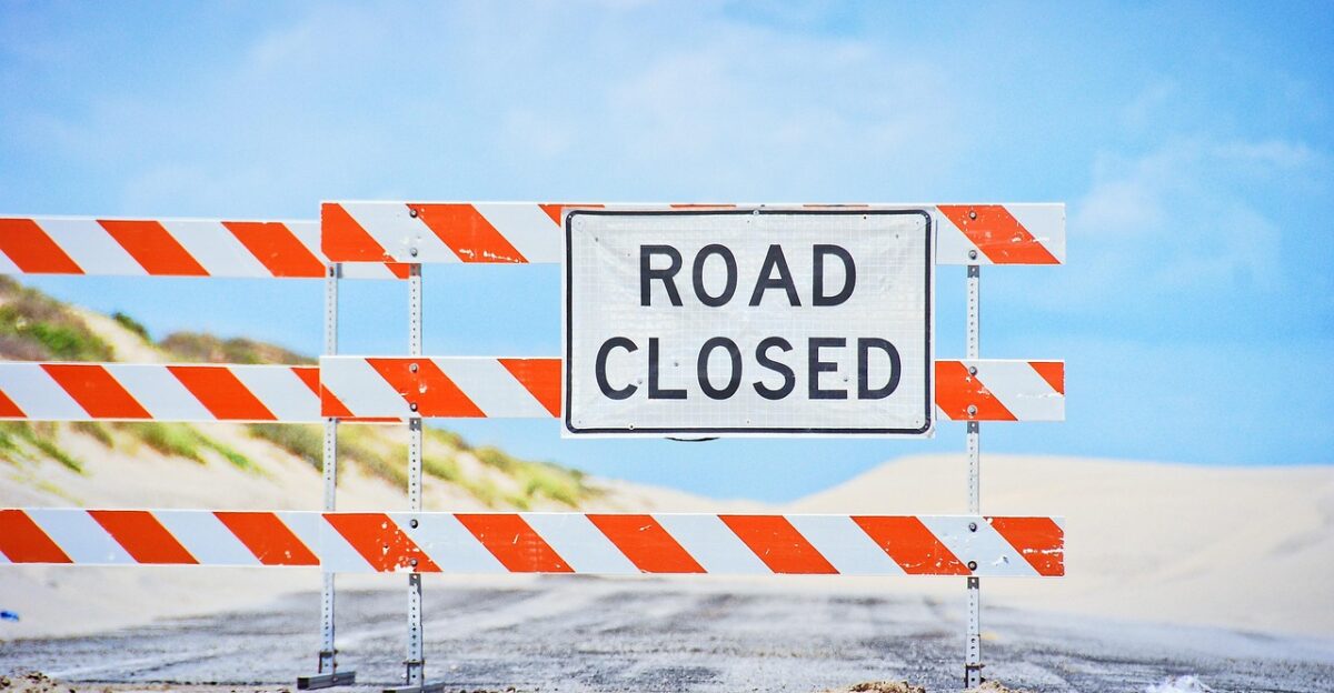 signpost closed road-sign end stop barrier end stop stop stop barrier barrier barrier barrier barrier