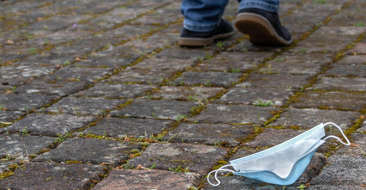 mouth guard over hope pandemic covid-19 corona mask duty past breathe a sigh of relief liberation freedom protection protective mask health duty precaution caution protection measures obsolete lose pandemic duty lose lose lose lose lose