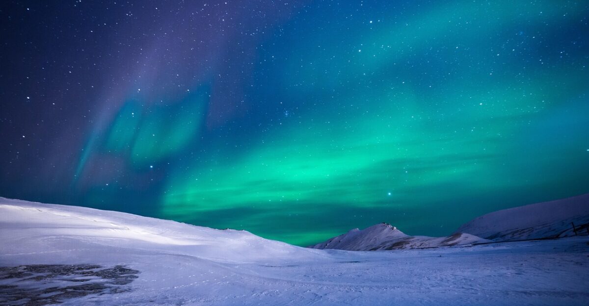 christmas background aurora northern lights aurora borealis snow fields snow fields hoarfrost stars starry night night sky starry arctic snowy landscape cold night nature phenomenon natural phenomenon zoom background
