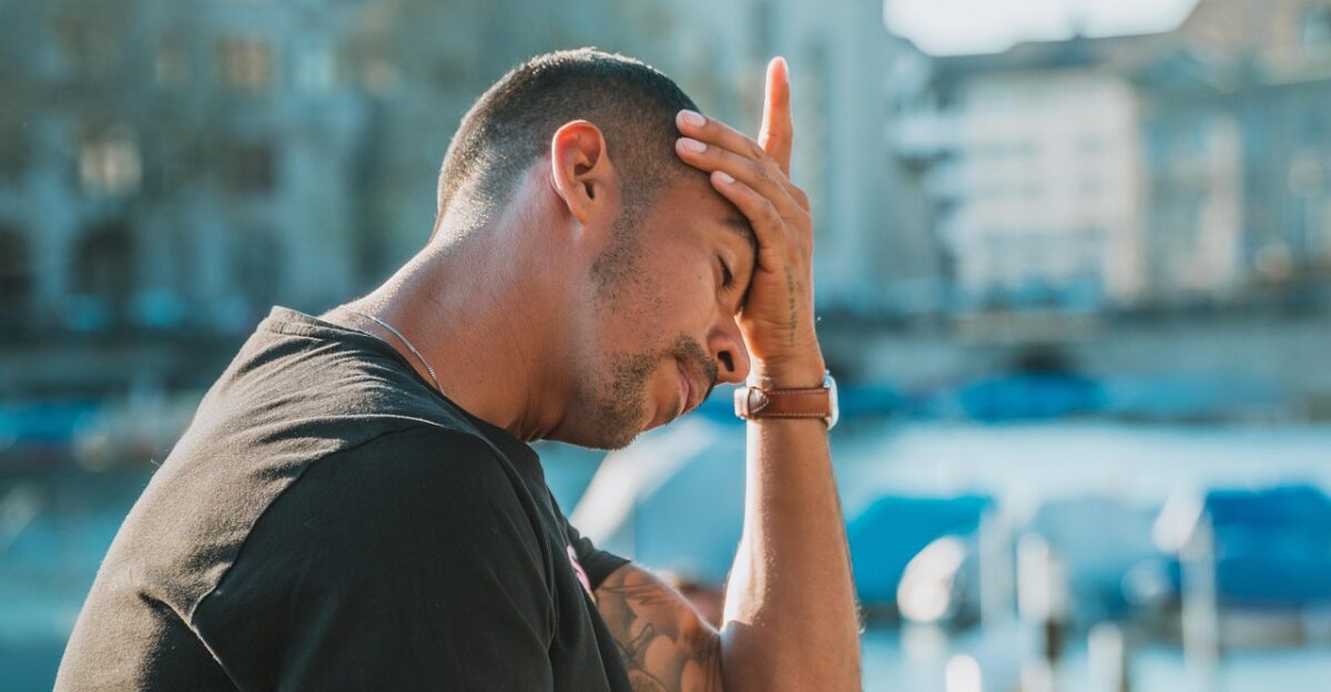 desperate think stressed out headache depressed sad grief saddened dissatisfied hopeless man young head think headache headache headache headache headache depressed sad sad sad