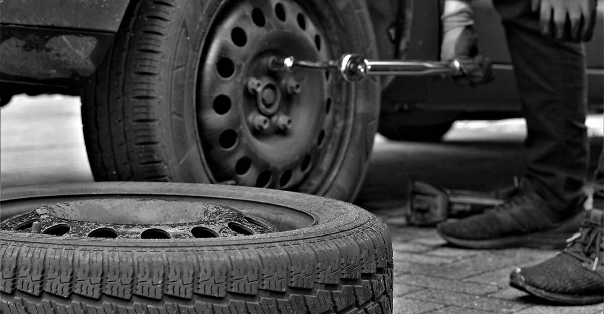 winter tires tire service tire automobile tyres car tire rubber security nature tire profile vehicles snow tire disposal second hand season power screws nuts man rims assembly assemble black-and-white hands tool