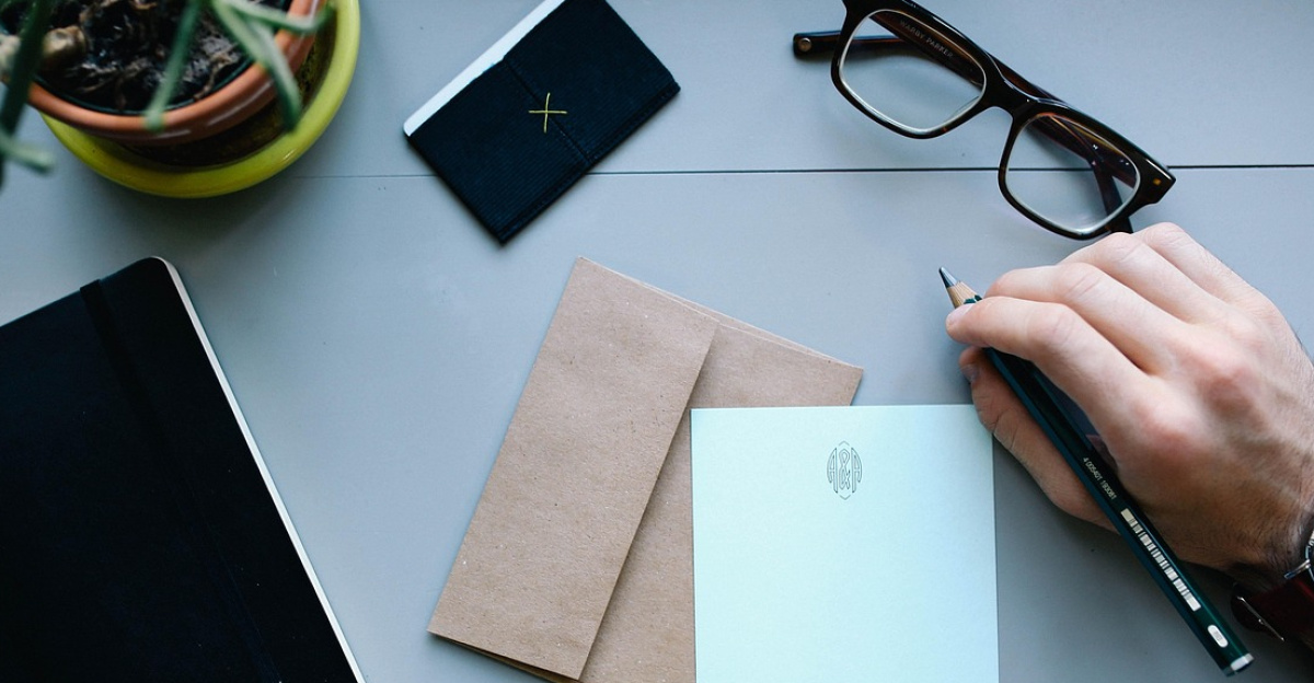 hand, man, watch, work, desk, workspace, people, business, male, person, businessman, letter, envelope, pen, writing, notebooks, business, business, letter, letter, letter, letter, letter, envelope, writing