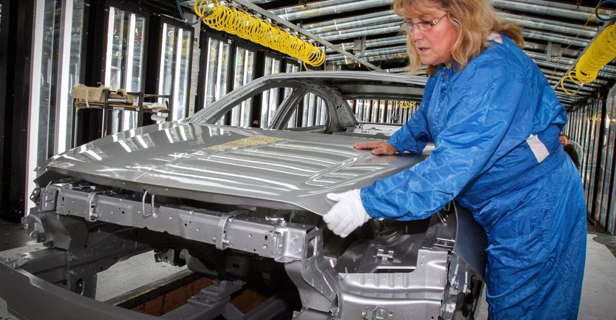 A worker on the line at the General Motors Fairfax Assembly Plant Kansas City Kansas USA Image licensed under CC 3 0 more information here