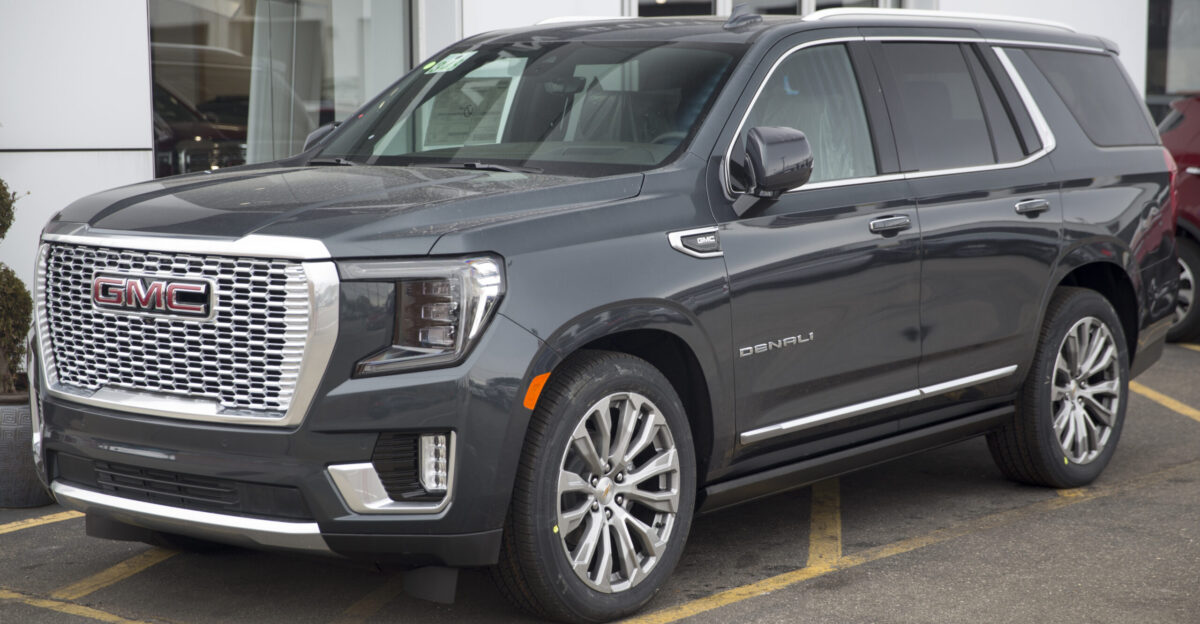 GMC Yukon Denali in Hunter Metallic with Dark Walnut Ash Gray interior 6 2-liter Ecotec3 V8 engine 10-speed auto and so on Assembled in Arlington TX Optional power sliding floor console