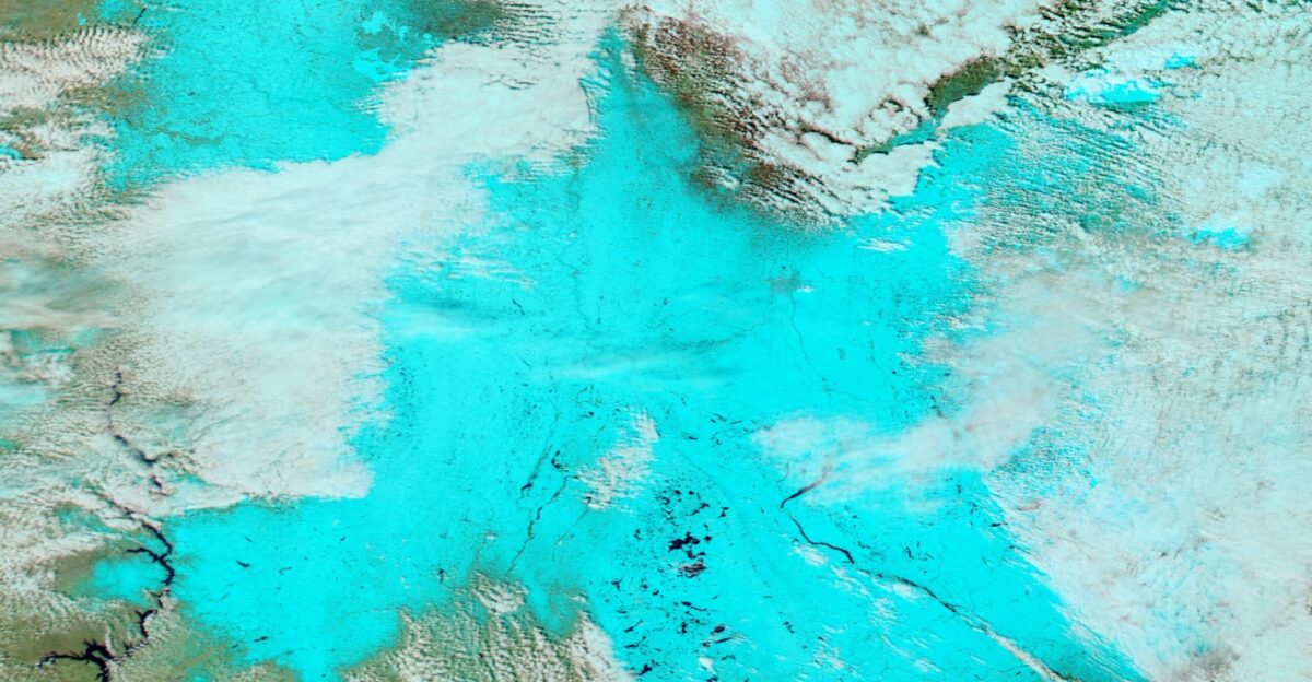 From April 1-2 2025 a late-season storm blanketed parts of South Dakota North Dakota and Minnesota with fresh snow Called the April Fool s Day Storm by local media in Minnesota the storm first wound up over that state on April 1 creating slick roads and white-out conditions before walloping the Dakotas the next day According to Minnesota Weather News the April Fool s Day Storm impacted the state s Northland the hardest Snow totals in Hovland a community located in the northeastern part of the state on the North Shore of Lake Superior were the highest in the state coming in at 15 2 inches 38 6 cm Fergus Falls was a close second with 15 1 inches 38 cm The towns of Cormorant and Finland received 14 8 inches 37 6 cm and 14 4 inches 36 6 cm respectively By April 2 both North and South Dakota were feeling the storm s impact Local media reported dangerous driving conditions with poor visibility and multiple slide-offs occurred in several locations By the end of the day snow totals included 8 inches 20 3 cm in Ellendale and LaMoure both located in southeastern North Dakota The highest total in South Dakota reported by media outlets was 9 3 inches 23 6 cm On April 3 skies cleared enough for the Moderate Resolution Imaging Spectroradiometer MODIS on NASA s Aqua satellite to acquire this false-color image of fresh snowfall across the region North Dakota sits in the northeast above South Dakota which has the Missouri River curling through its center Minnesota lies to the east with the Minnesota River forming a border between South Dakota and Minnesota In this type of image snow and ice appear electric blue clouds typically are bright white although cold high clouds that hold ice crystals may have a tint of electric blue In addition vegetation looks green open land shows as tan and water appears dark blue