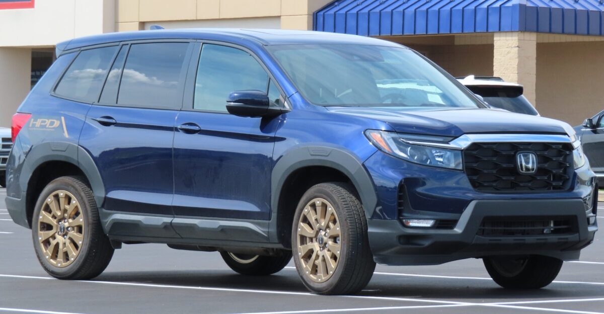 Honda Passport EX-L AWD with HPD Bronze Package photographed in New Castle Pennsylvania Finished in Obsidian Blue Pearl