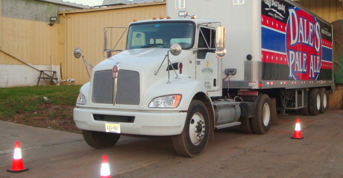 Kenworth tractor and Great Dane Trailer with HTS Systems HTS-CC Cone Cradle traffic safety cone carrier HTS Systems new HTS-CC Cone Cradle traffic safety cone deployment system designed for straight trucks and semi trailers can hold 3-4 18 safety cones and help route drivers deploy or store them in just seconds Used in conjunction with the Three Cone Safety Policy the Cone Cradle is extremely effective because it works Create awareness slow traffic reduce docking collisions and protect workers when making deliveries The HTS-CC is safer faster easier save route time lives and money