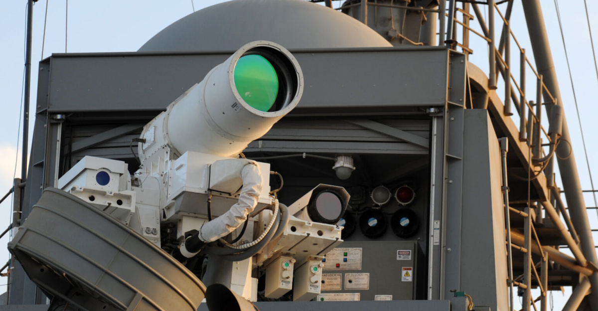 The U.S. Navy Afloat Forward Staging Base (Interim) USS <i>Ponce</i> (AFSB(I)-15) conducts an operational demonstration of the Office of Naval Research (ONR)-sponsored Laser Weapon System (LaWS) while deployed to the Arabian Gulf.