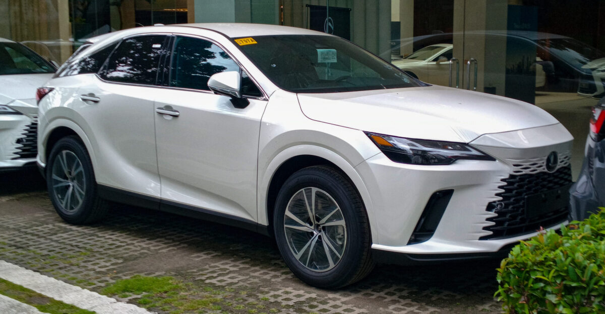 Lexus RX 350h Premier AWD in Sonic Quartz being readied for delivery 2 5-liter hybrid AWD eCVT
