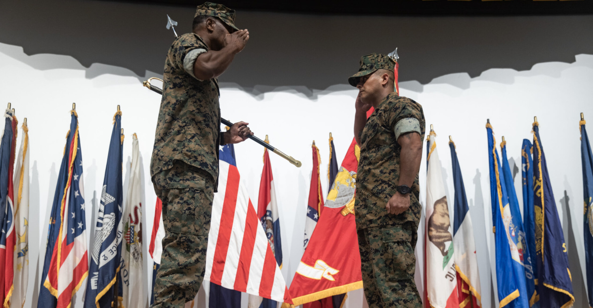 U.S. Marine Corps Lt. Col. Calischaran James, left, commanding officer of Marine Aviation Logistics Squadron (MALS) 36, Marine Aircraft Group (MAG) 36, 1st Marine Aircraft Wing, (MAW), returns a salute to Sgt. Maj. Enrique De Anda, the incoming sergeant major of MALS-36, on Marine Corps Air Station Futenma, Okinawa, Japan, Aug. 26, 2025. During the ceremony, Sgt. Maj. De Anda was appointed as the sergeant major of MALS-36. (U.S. Marine Corps photo by Lance Cpl. Carlos Paz-Sosa)