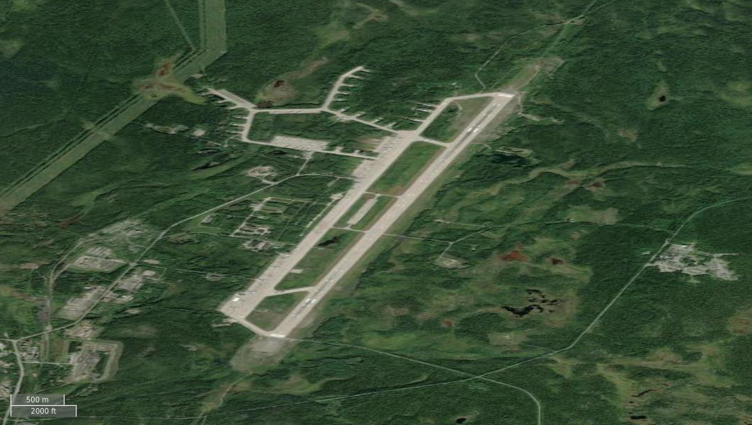 NASA FIRMS imagery 2024-10-17 of Olenya air base NB The terrain imagery is older and undated